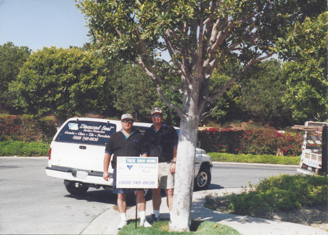 Diamond Seal Systems team members with a company service vehicle